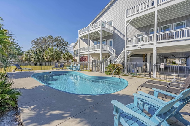 view of swimming pool featuring a patio