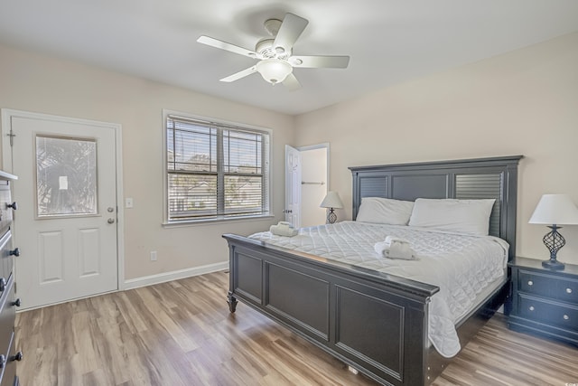 bedroom featuring ceiling fan and light hardwood / wood-style flooring