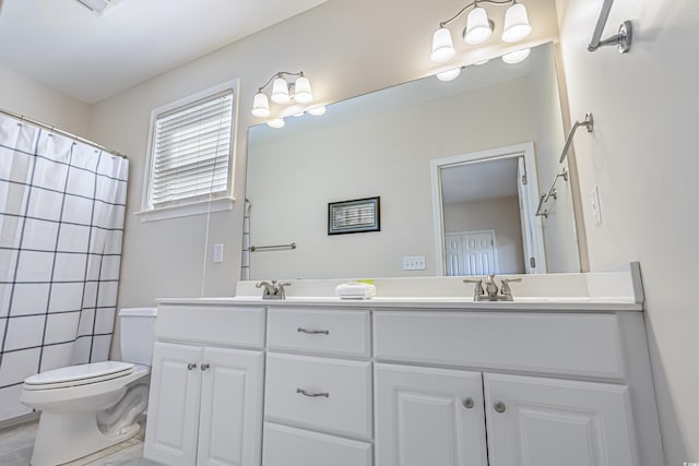 bathroom with vanity, a shower with curtain, and toilet