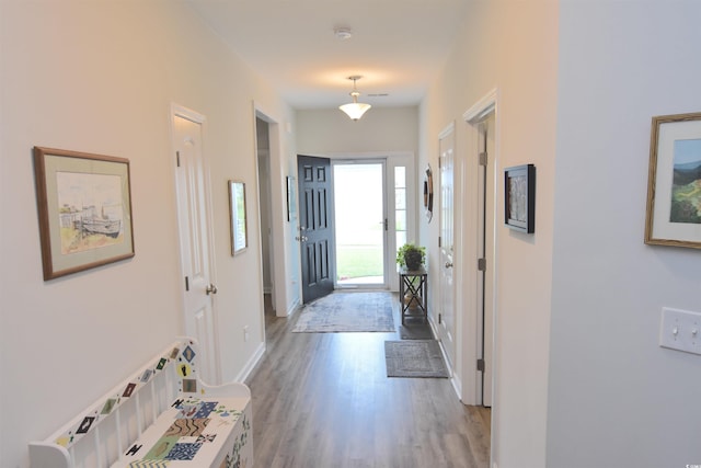 hall featuring hardwood / wood-style flooring