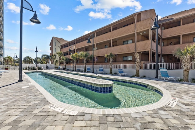 view of pool featuring a patio