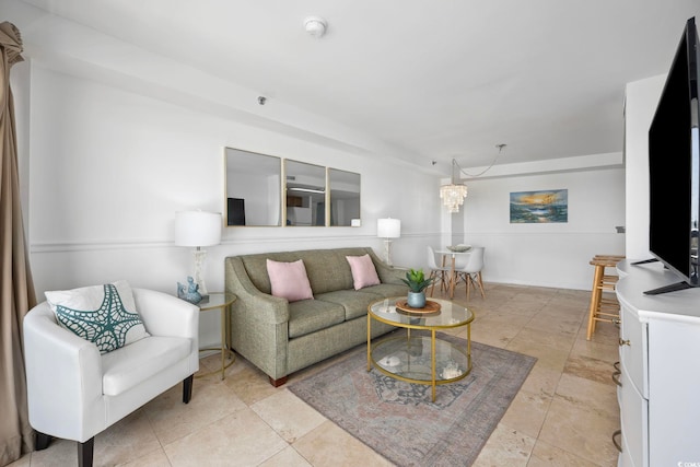 living room with a chandelier