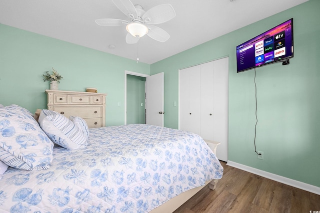 bedroom featuring a closet, ceiling fan, and dark hardwood / wood-style floors