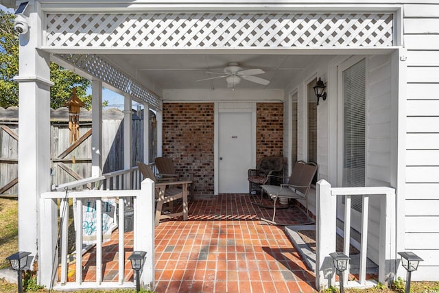 view of patio featuring ceiling fan