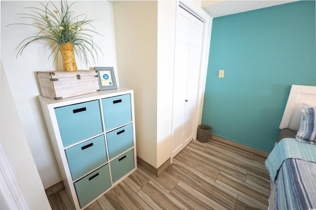 bedroom with light hardwood / wood-style floors