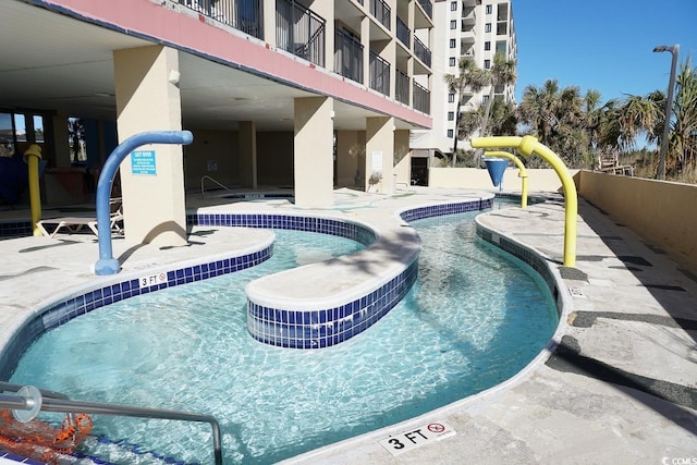 4800 S Ocean Blvd Unit 1522, North Myrtle Beach, SC 29582 - community pool featuring a patio