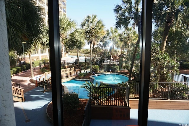 view of swimming pool with a patio area