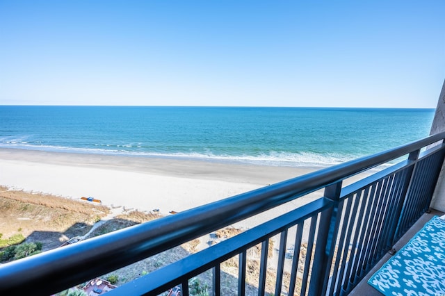 property view of water featuring a beach view