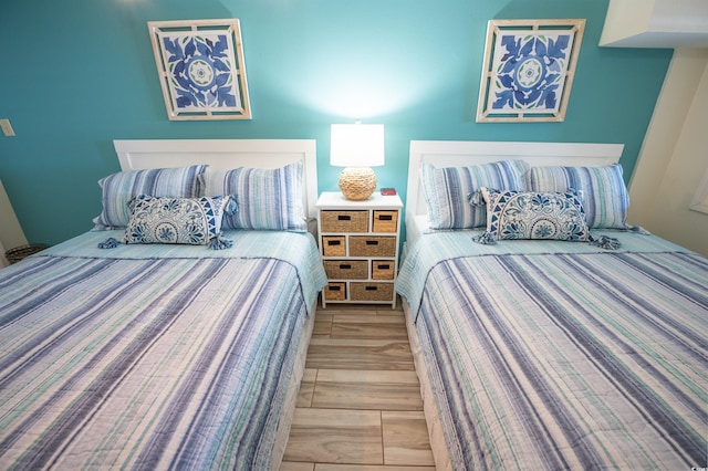 bedroom with light hardwood / wood-style flooring