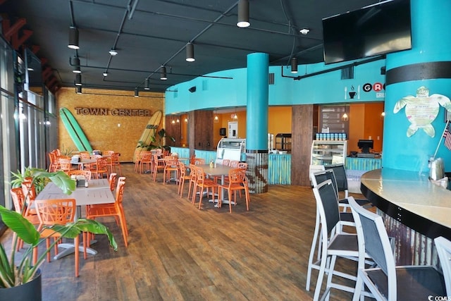 4800 S Ocean Blvd Unit 1522, North Myrtle Beach, SC 29582 - dining space with wood finished floors and track lighting