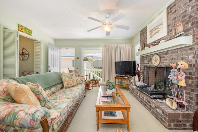 206 56th Ave N, North Myrtle Beach, SC 29582 - living area featuring carpet floors, plenty of natural light, a ceiling fan, a textured ceiling, and a fireplace