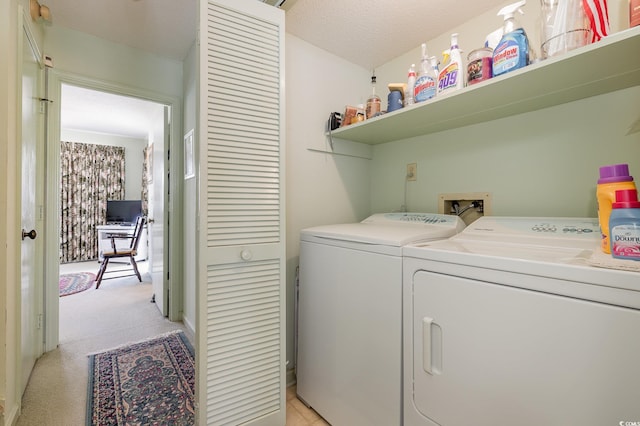 206 56th Ave N, North Myrtle Beach, SC 29582 - laundry area with washer and dryer and light colored carpet