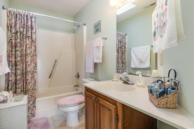 full bathroom featuring toilet, vanity, tile patterned floors, and shower / tub combo with curtain