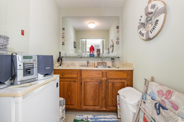 bathroom featuring vanity and a textured ceiling