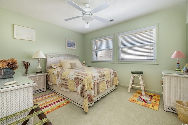 206 56th Ave N, North Myrtle Beach, SC 29582 - carpeted bedroom with a ceiling fan and baseboards