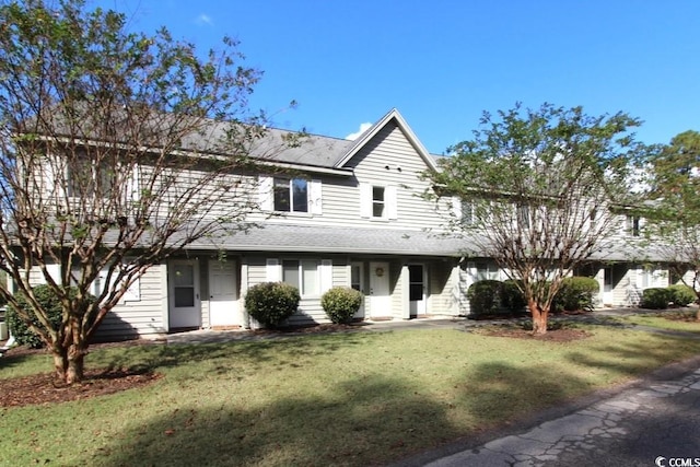 view of front facade with a front yard