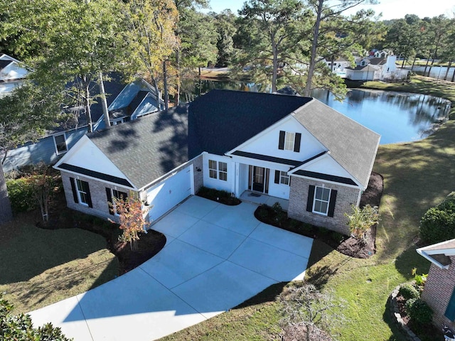 drone / aerial view with a water view