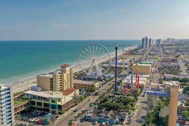 bird's eye view with a view of the beach and a water view