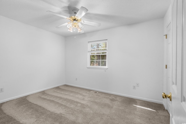 2925 Carriage Row Ln Unit 134, Myrtle Beach, SC 29577 - carpeted spare room featuring a ceiling fan and a textured ceiling