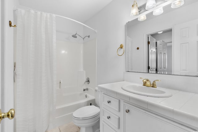 full bathroom featuring vanity, toilet, and shower / tub combo with curtain