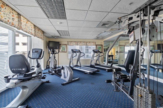 2709 Ocean Blvd S Unit 1202, Myrtle Beach, SC 29577 - workout area featuring a drop ceiling and baseboards