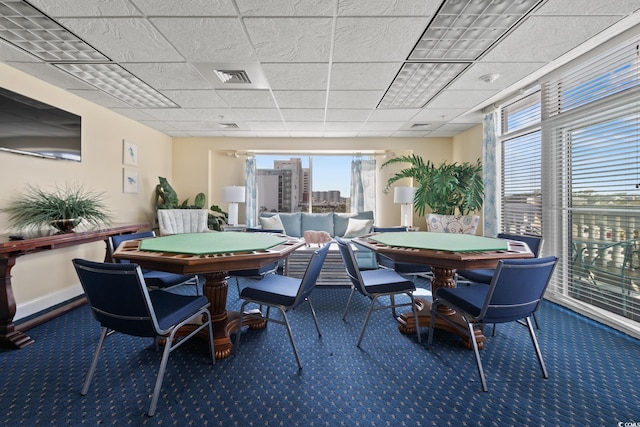 2709 Ocean Blvd S Unit 1202, Myrtle Beach, SC 29577 - carpeted dining space with a paneled ceiling