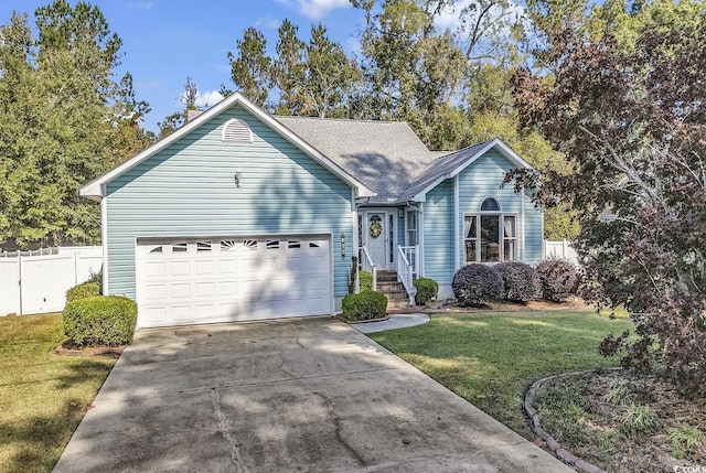 153 Garden Ave, Georgetown, SC 29440 - view of front facade featuring concrete driveway and an attached garage