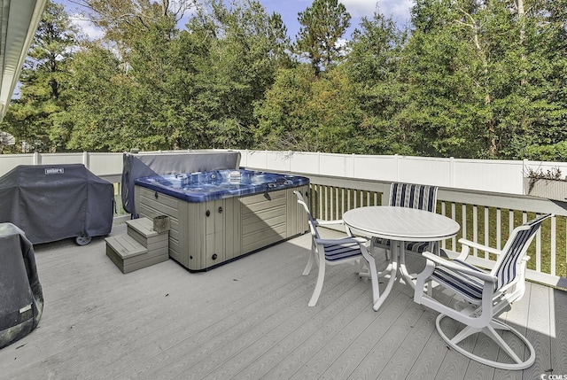 153 Garden Ave, Georgetown, SC 29440 - deck with a hot tub, outdoor dining space, and a grill