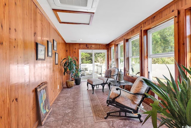 sunroom / solarium featuring a healthy amount of sunlight