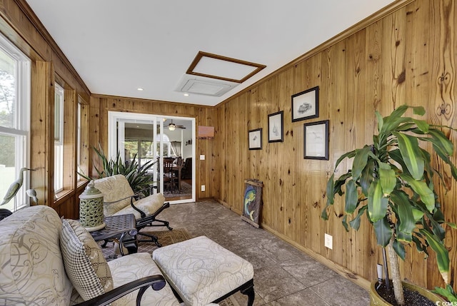 153 Garden Ave, Georgetown, SC 29440 - sitting room featuring plenty of natural light, wooden walls, baseboards, crown molding, and attic access