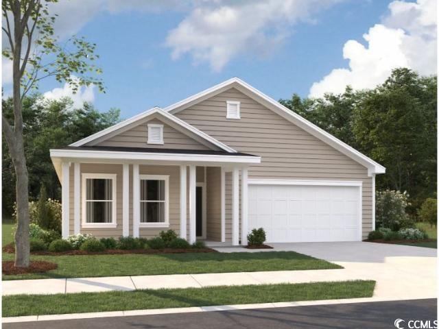 view of front of property featuring a front lawn and a garage