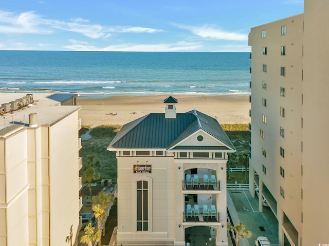 view of water feature with a beach view