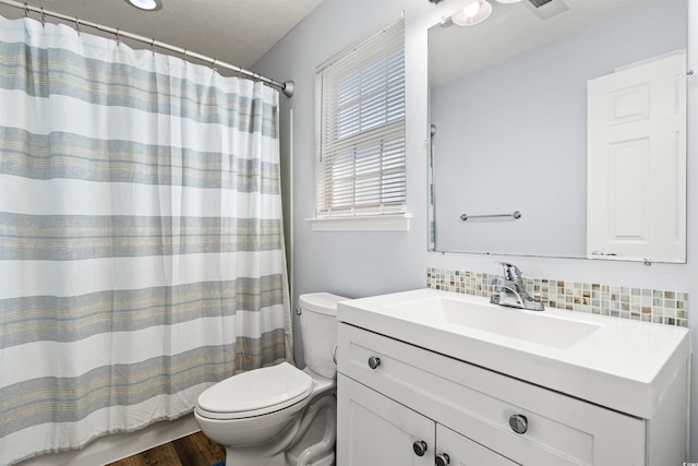 481 Irees Way, Longs, SC 29568 - bathroom with toilet, vanity, decorative backsplash, and curtained shower