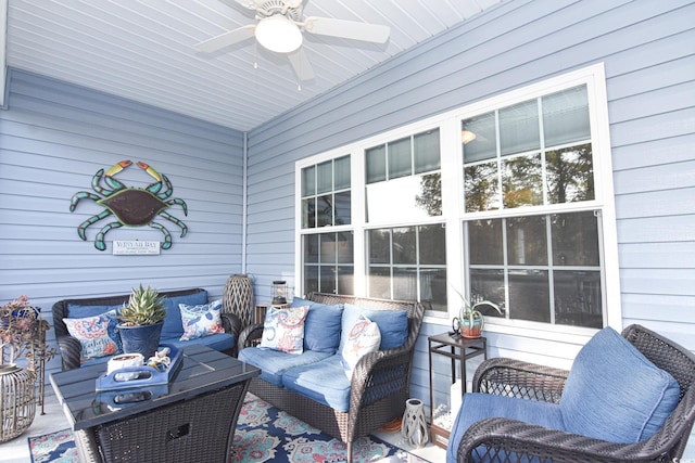 view of patio with ceiling fan and an outdoor living space