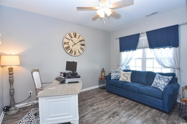 home office featuring dark wood-type flooring and ceiling fan