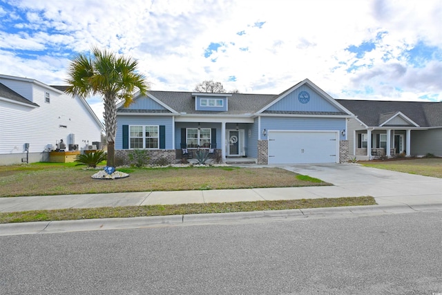 craftsman-style house with a garage and a front yard