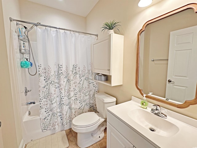 full bathroom with toilet, shower / bath combo, vanity, and tile patterned floors