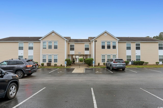 8546 Hopkins Cir Unit G, Surfside Beach, SC 29575 - view of property featuring uncovered parking
