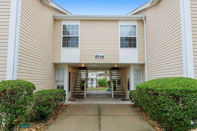 8546 Hopkins Cir Unit G, Surfside Beach, SC 29575 - property entrance with a carport