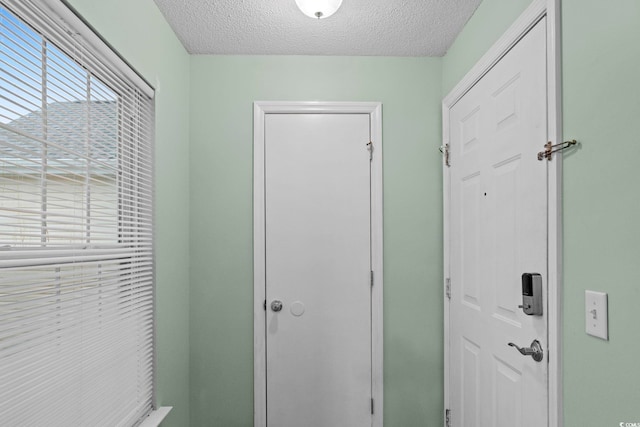 8546 Hopkins Cir Unit G, Surfside Beach, SC 29575 - hall with a textured ceiling