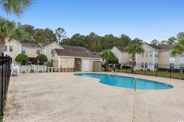 8546 Hopkins Cir Unit G, Surfside Beach, SC 29575 - community pool featuring a patio area and fence