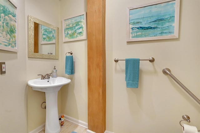 bathroom featuring tile patterned floors and sink