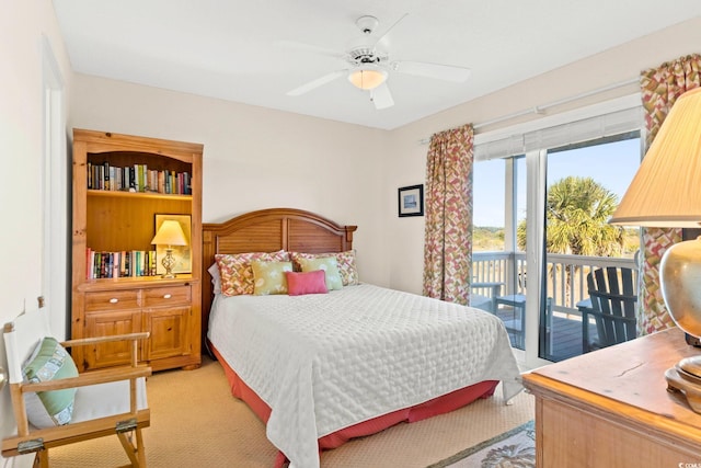 carpeted bedroom featuring ceiling fan and access to outside