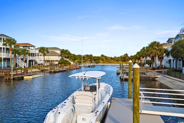 view of dock with a water view