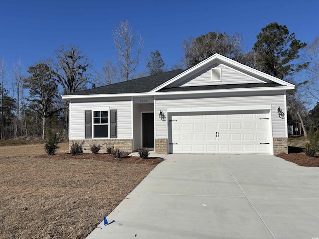 view of front of home with a garage