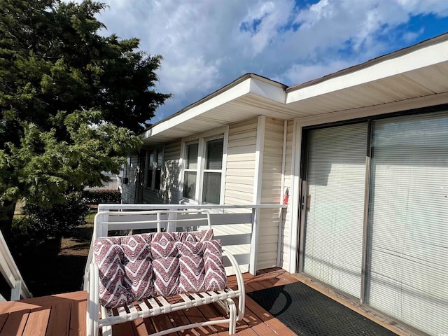 wooden balcony featuring a wooden deck