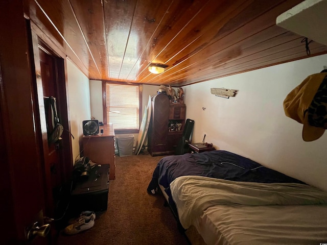 carpeted bedroom featuring wooden ceiling