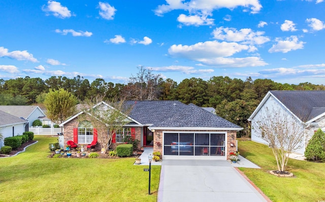 ranch-style home featuring brick siding and driveway