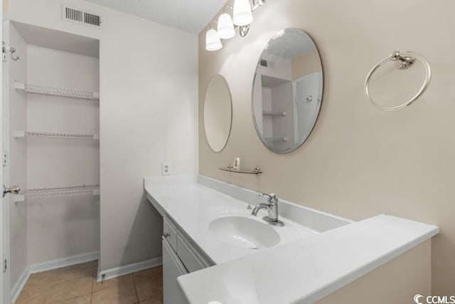 bathroom featuring vanity and tile patterned floors