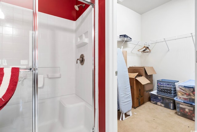 bathroom featuring an enclosed shower